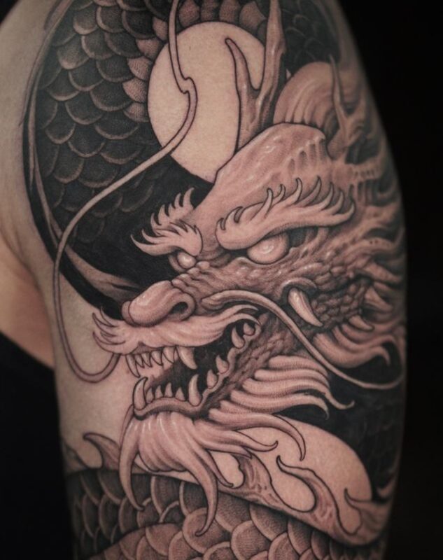 Hình xăm đầu rồng đẹp ở tay