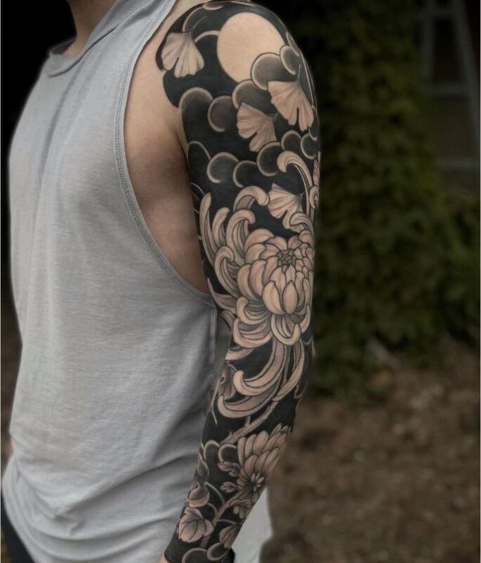 Hình xăm hoa mẫu đơn kín tay